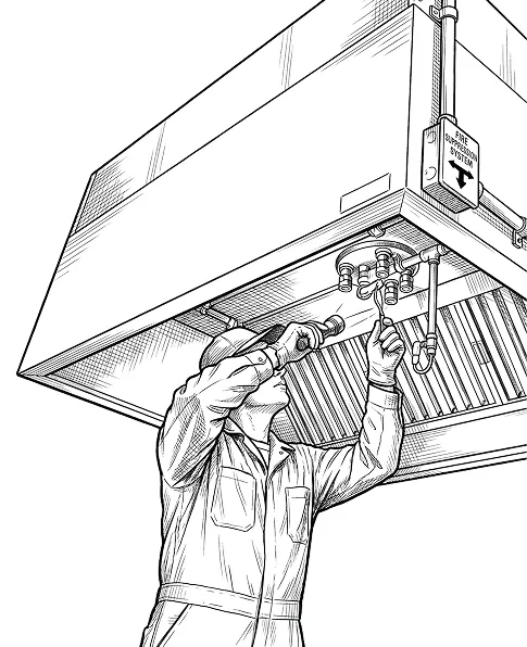 Technician servicing a commercial kitchen exhaust hood